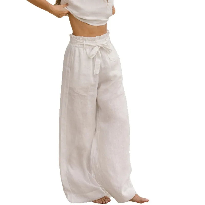 Women's linen top by FJØRNA with ruffle detail, featuring a lightweight, breezy design perfect for casual and summer wear.