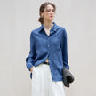 FJØRNA women's linen blend shirt, casual top with relaxed fit and natural fabric texture, styled with buttons and a collar.