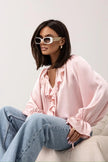 FJØRNA satin blouse for women with ruffle detail, stylish women's top featuring elegant fabric and feminine design.
