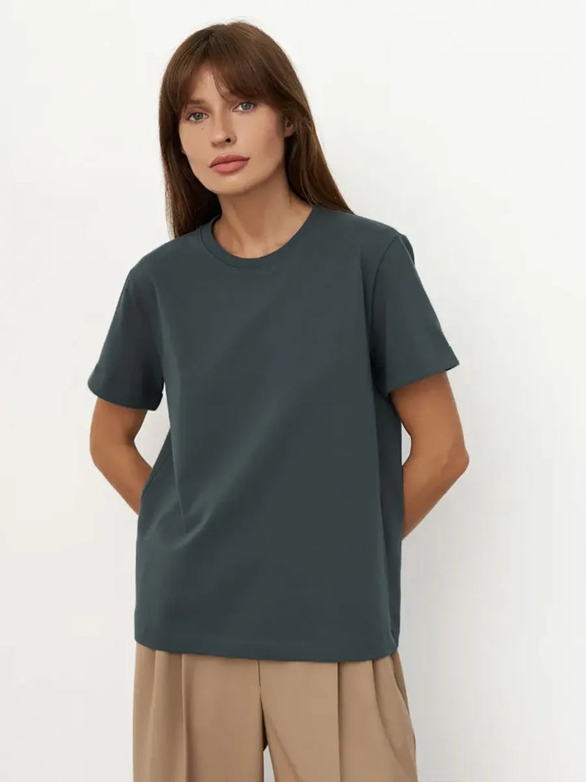 Women’s white cotton T-shirt from FJØRNA, casual top with short sleeves and a relaxed fit, displayed flat on a plain background.
