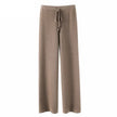 FJØRNA women's joggers pants, casual and comfortable, navy blue with elastic waistband and tapered fit for everyday wear.