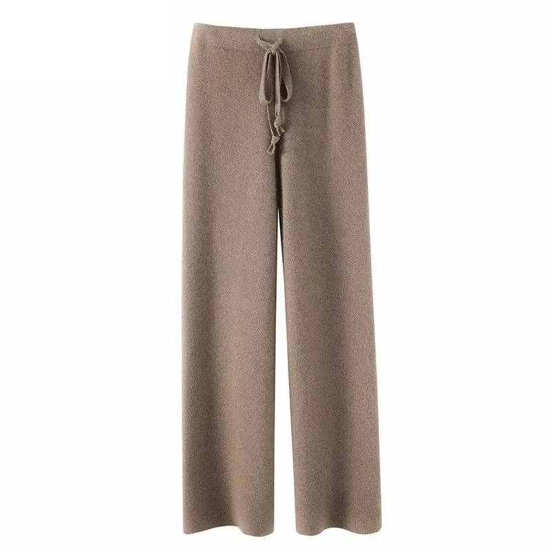 FJØRNA women's joggers pants, casual and comfortable, navy blue with elastic waistband and tapered fit for everyday wear.