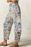 FJØRNA women's wide-leg denim jeans displayed on a model, showcasing relaxed fit and classic blue denim fabric.