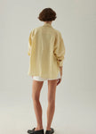 FJØRNA women's knit shirt with slit hem, featuring a cozy, fitted design and stylish slit detail on the hem.