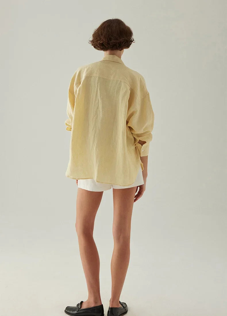 FJØRNA women's knit shirt with slit hem, featuring a cozy, fitted design and stylish slit detail on the hem.