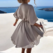 FJØRNA stylish summer mini dress, casual wedding dress in lightweight fabric, featuring a relaxed fit and elegant design.