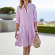 FJØRNA women's striped tiered summer mini dress featuring a sleeveless design and playful, colorful horizontal stripe pattern.