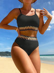 FJØRNA women's black chevron bikini set with retro high-waist, structured fabric, and spaghetti straps, ideal for swimwear.