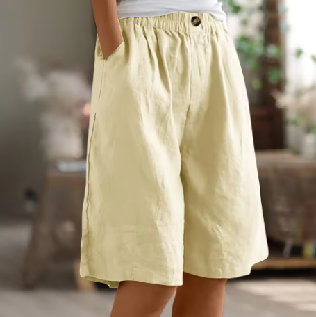 FJØRNA Renee™ Comfort Shorts shown in light fabric with a relaxed fit, featuring an elastic waistband and casual style.