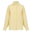 FJØRNA women's knit shirt with slit hem, featuring a soft, fitted design and stylish details, perfect for casual or chic outfits.