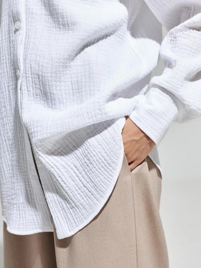 Lacceti Valencia 100% cotton summer shirt displayed on a hanger, featuring a lightweight, breathable fabric in a stylish design.