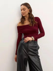 FJØRNA women's off-shoulder cotton top featuring a relaxed fit and stylish design, perfect for casual and summer wear.