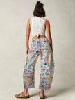 Women’s wide-leg denim jeans by FJØRNA, showcasing classic blue denim fabric and relaxed fit pants for casual style.