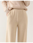 FJØRNA women's merino wool wide-leg joggers pants, soft and comfortable for casual wear, shown in a relaxed fit style.