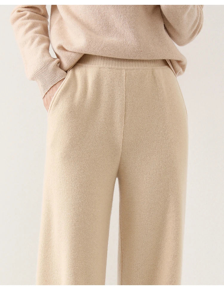 FJØRNA women's merino wool wide-leg joggers pants, soft and comfortable for casual wear, shown in a relaxed fit style.