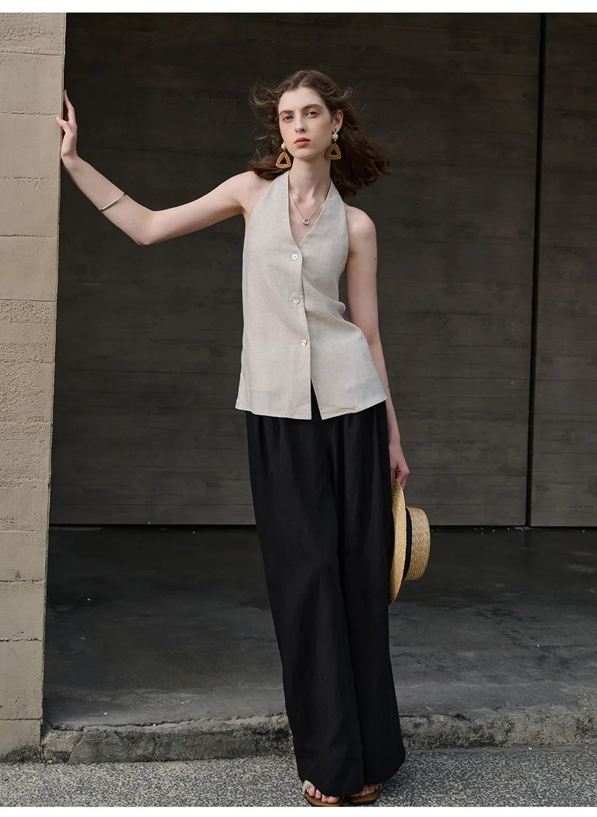 FJØRNA linen waistcoat for women in halter neck style, sleeveless top with a relaxed fit, ideal for casual and summer outfits.