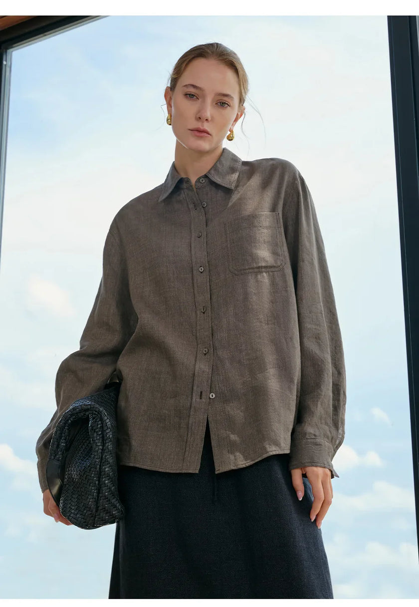 Women’s linen blend shirt by FJØRNA, showing a lightweight, casual top with a relaxed fit and natural fabric texture.