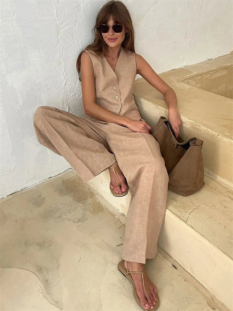 FJØRNA women's linen wide-leg trousers from co-ord set, relaxed fit pants with breathable fabric and stylish silhouette.