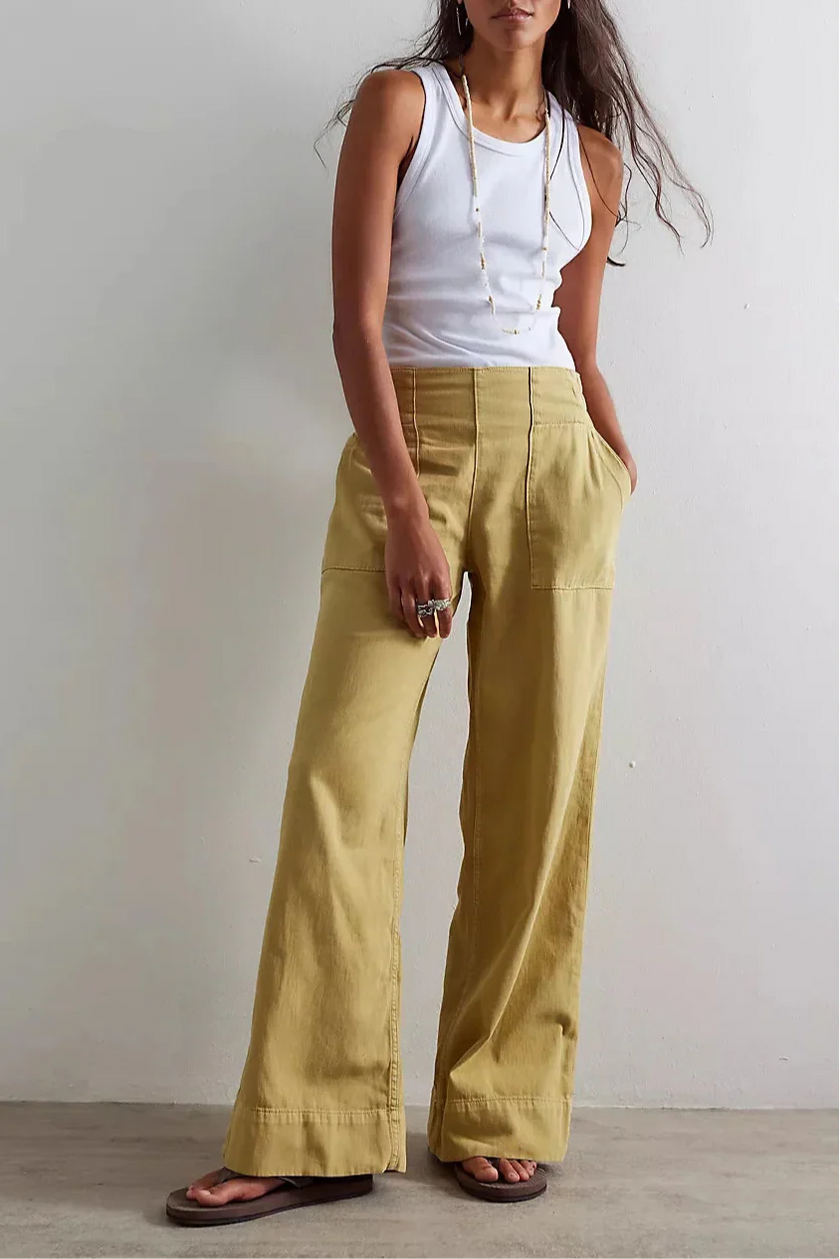 FJØRNA women's wide-leg denim jeans displayed with a relaxed fit and classic blue denim fabric.