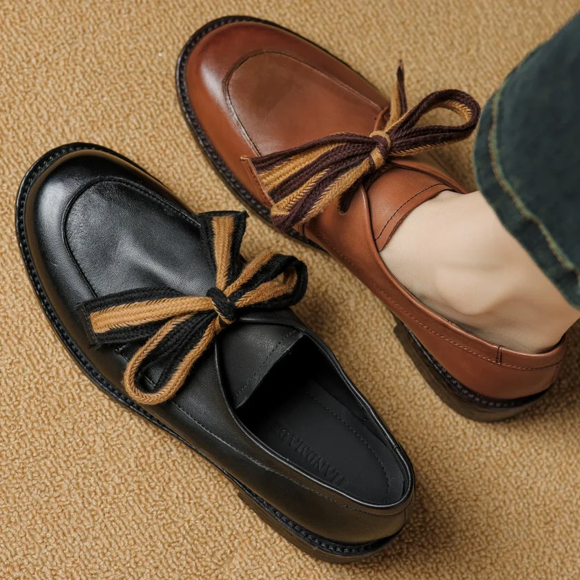 Handcrafted women's leather loafers with cushioned insoles from FJØRNA, featuring a sleek design and smooth leather finish.