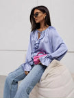 FJØRNA satin women's blouse with ruffle detail, stylish tops for women, elegant and smooth fabric.