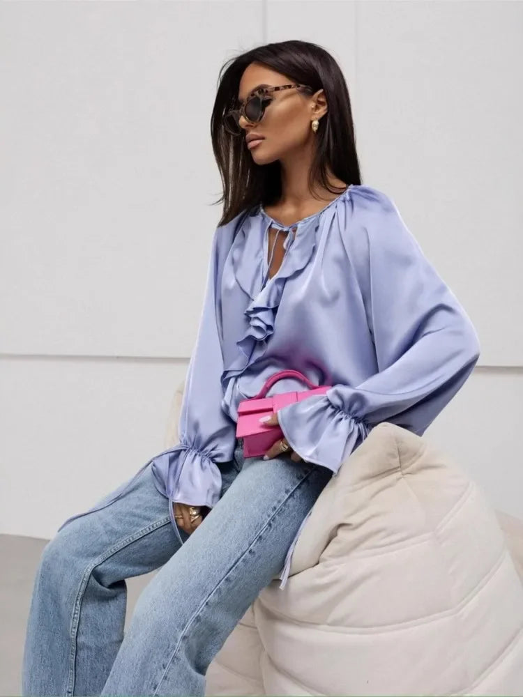 FJØRNA satin women's blouse with ruffle detail, stylish tops for women, elegant and smooth fabric.