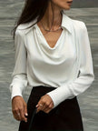 FJØRNA women's long sleeve satin shirt, elegant and smooth fabric, shown in a stylish long sleeve top for women.
