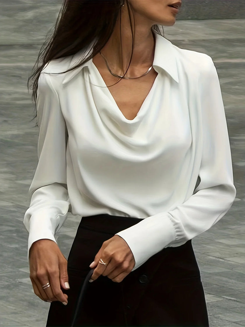 FJØRNA women's long sleeve satin shirt, elegant and smooth fabric, shown in a stylish long sleeve top for women.