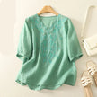 FJØRNA women's cotton blouse with V-neck, lightweight and breathable tops, featuring a relaxed fit and stylish design.