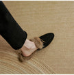 FJØRNA women's fur mule slippers with plush lining and slip-on design, cozy and luxurious footwear for women.