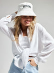 Lacceti Valencia 100% cotton summer shirt in light fabric, featuring a casual fit and classic collar, shown on a hanger.