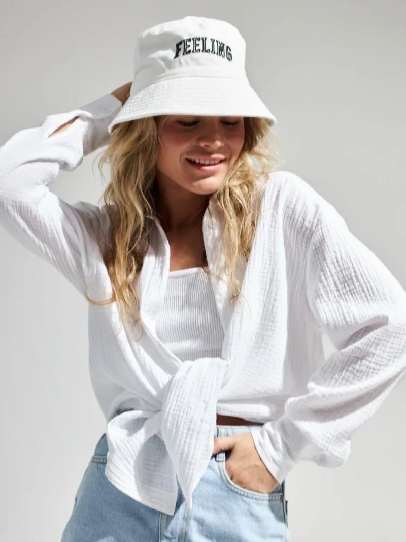 Lacceti Valencia 100% cotton summer shirt in light fabric, featuring a casual fit and classic collar, shown on a hanger.