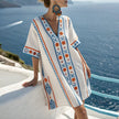 Flowy lightweight summer beach cover-up for women by FJØRNA, showing a breezy, sheer fabric perfect for beachwear.