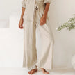 FJØRNA women's linen top with ruffle details, lightweight and breezy, perfect for casual or summer wear.