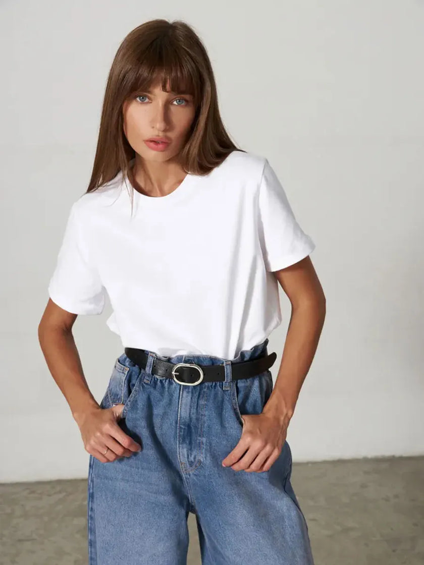 Women’s white cotton T-shirt from FJØRNA, casual short-sleeve top with round neckline, shown flat on a neutral background.