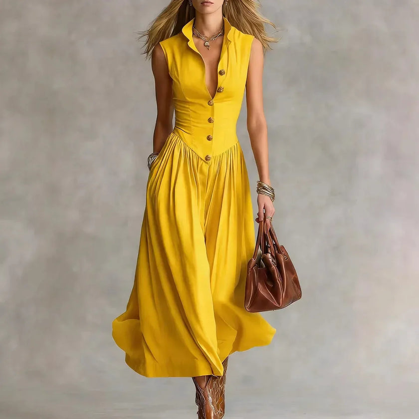FJØRNA Martina elegant flowy midi dress in lightweight fabric with a flattering silhouette and subtle pattern.