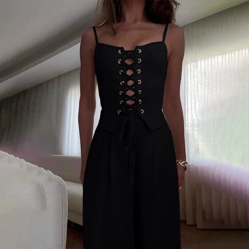 FJØRNA women’s sleeveless linen dress displayed on a hanger with a relaxed fit and natural fabric texture.