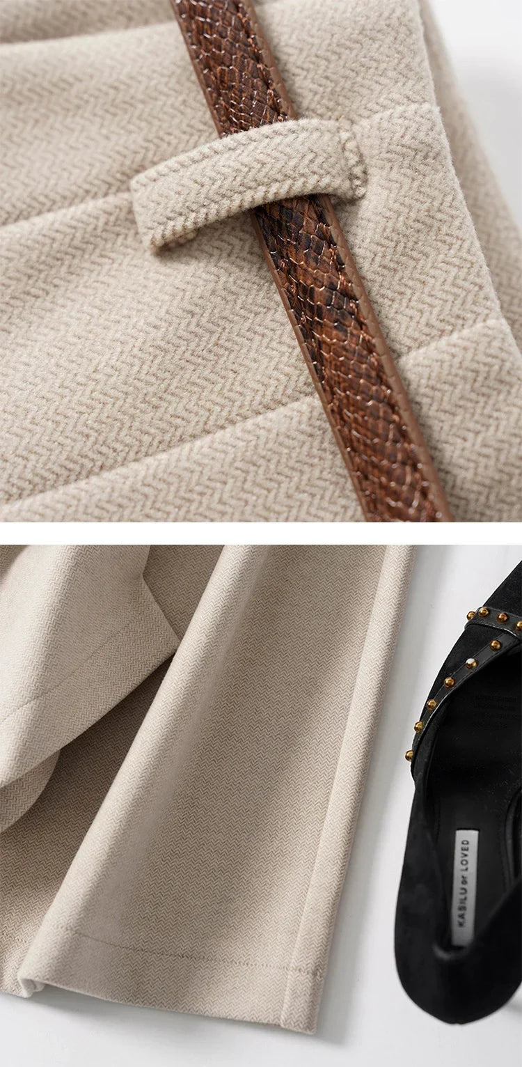 FJØRNA women's wool wide-leg high-waist trousers, stylish and comfortable pants with a tailored fit, shown in a neutral color.