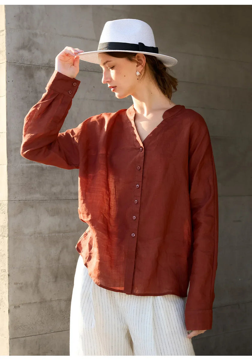 FJØRNA women's linen V-neck shirt, lightweight and breathable top, shown in a natural relaxed fit with short sleeves.