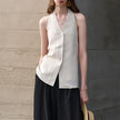 FJØRNA women's linen waistcoat with halter neck and sleeveless design, stylish top perfect for warm weather.