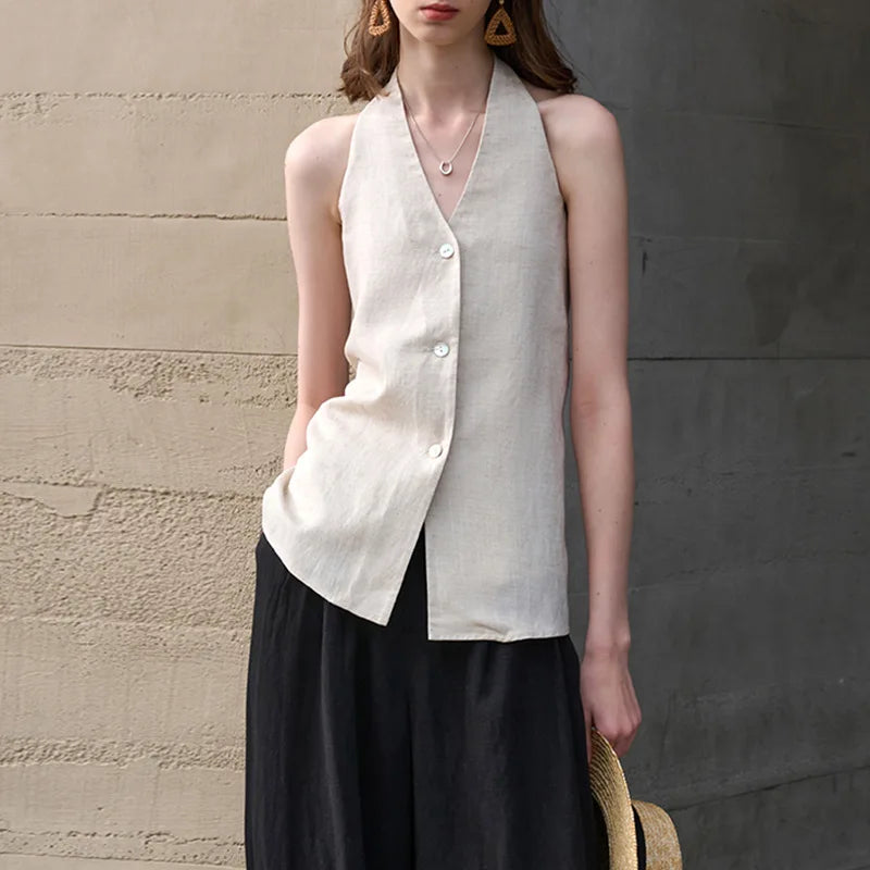 FJØRNA women's linen waistcoat with halter neck and sleeveless design, stylish top perfect for warm weather.