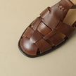 FJØRNA women's Italian leather sandals with adjustable straps, featuring a stylish open-toe design and comfortable fit.