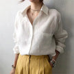 FJØRNA women's linen shirt with open collar, lightweight breathable top, casual and stylish for warm weather.