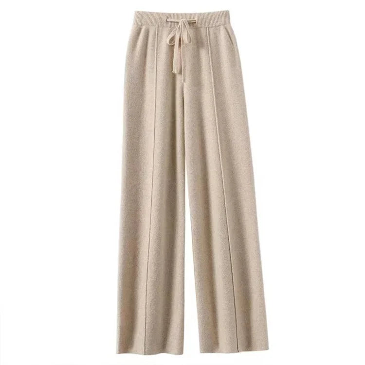 FJØRNA women's merino wool wide-leg high-waist trousers, stylish and comfortable for casual or professional wear.