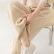FJØRNA women's merino wool wide-leg joggers with relaxed fit and soft texture, perfect for comfortable casual wear.