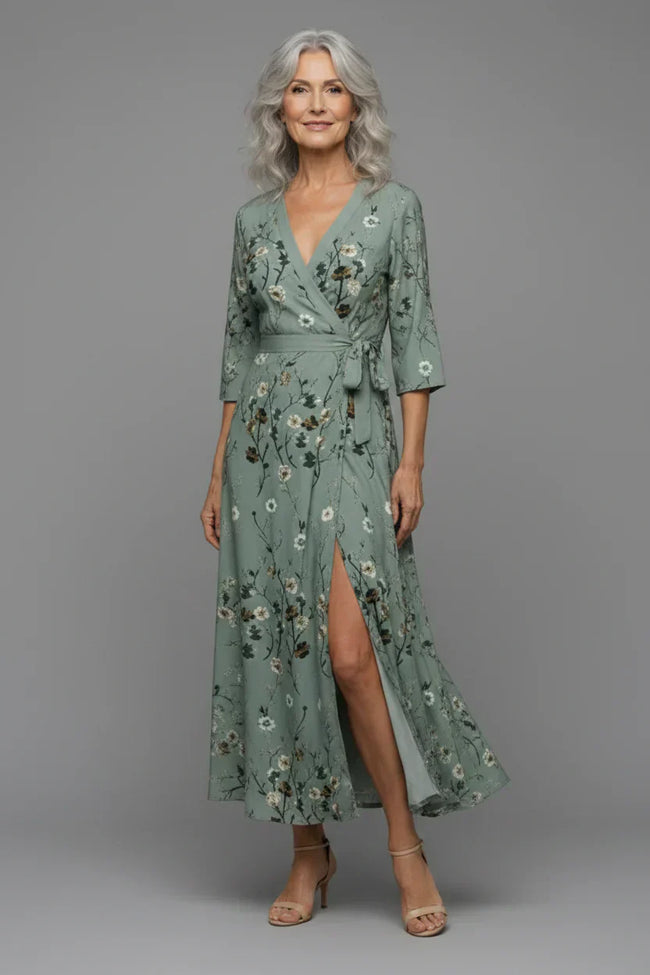 FJØRNA elegant floral halter neck sleeveless maxi dress for women, featuring a flowing design and vibrant bloom pattern.
