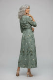 FJØRNA elegant floral maxi dress for women with halter neck and sleeveless design, perfect for summer or special occasions.