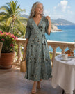 FJØRNA floral halter neck sleeveless maxi dress for women with a flowy silhouette and elegant design.
