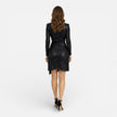 Elegant women's sequin blazer dress by FJØRNA featuring a wrap mini design with shiny sequin details.