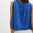FJØRNA women's lace cami top with trim, featuring delicate lace fabric and adjustable straps on a neutral background.